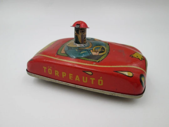 Törpeautó clockwork car. Colours lithographed tinplate. Lemezarugyar Toys. Hungary. 1980's Törpeautó clockwork car. Colours lithographed tinplate. Lemezarugyar Toys. Hungary. 1980's