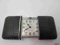 Travel watch Movado Carassale. 935 silver. Manual wind. Leather case. 1950's