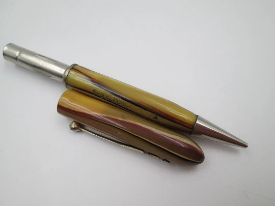 Try Mitchell's Gas advertising mechanical pencil. Marble celluloid. Twist system. 1930's