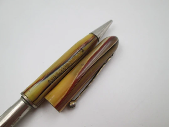Try Mitchell's Gas advertising mechanical pencil. Marble celluloid. Twist system. 1930's