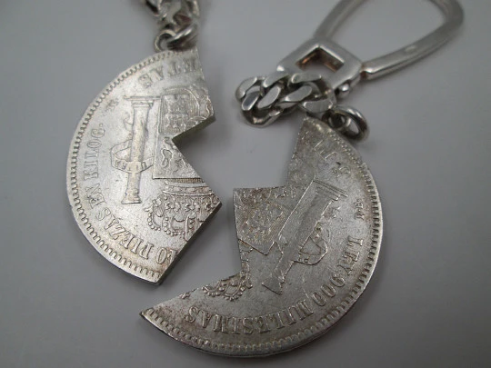Two keychains. 900 sterling silver. King Alfonso XII. Divided 5 pesetas coin