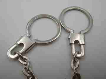 Two keychains. 900 sterling silver. Queen Isabel II. Divided 20 real coin