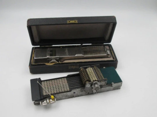 Two mechanical calculators. Comptator and Demonstrator. Nickel plated brass. Box. 1920's