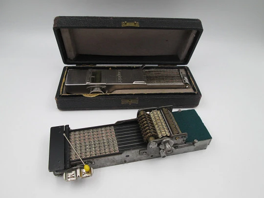 Two mechanical calculators. Comptator and Demonstrator. Nickel plated brass. Box. 1920's