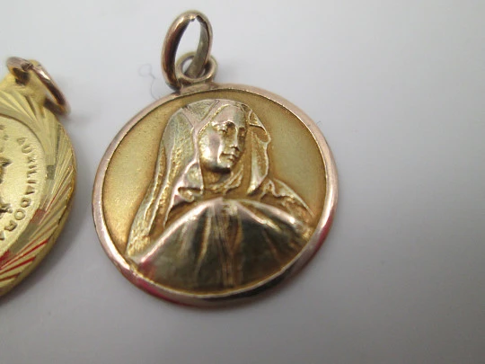 Two medals. Gold plated metal. Virgin Mary. Relief. Spain