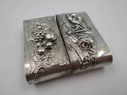 Two napkin rings. 833 sterling silver. Fruits and flowers. 1950's. Portugal (Porto)