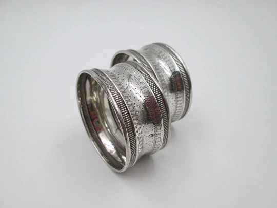 Two napkin rings. 950 sterling silver. Massat Freress. 1890's. France (Paris)