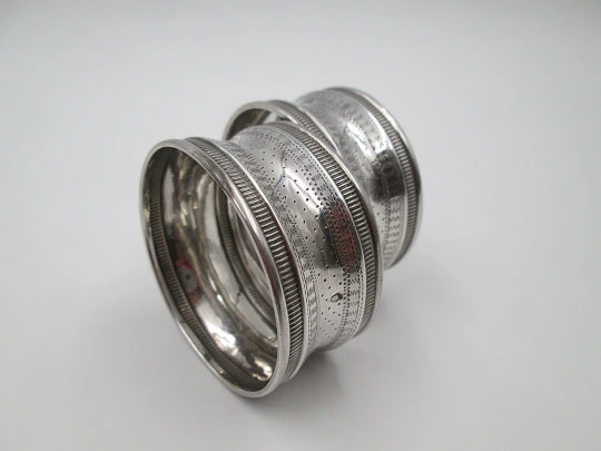 Two napkin rings. 950 sterling silver. Massat Freress. 1890's. France (Paris)