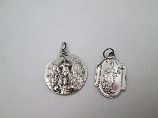Two religious medals. Sterling silver. Virgin of Montserrat and Guardian Angel. 1960's