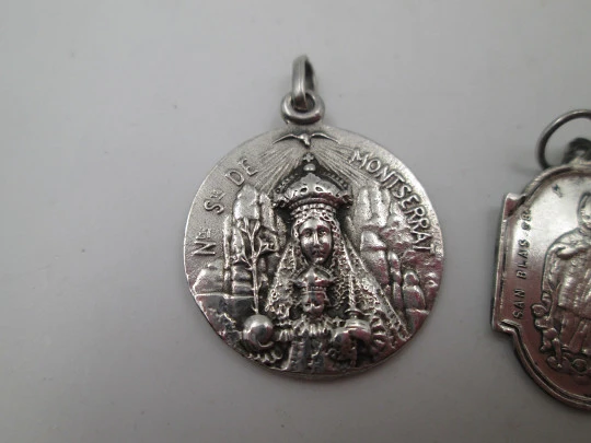 Two religious medals. Sterling silver. Virgin of Montserrat and Guardian Angel. 1960's