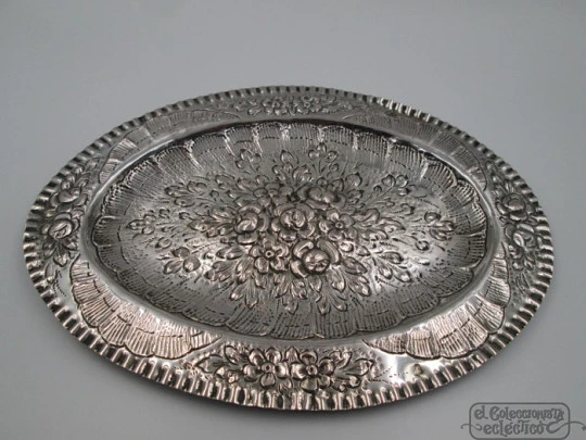 Two sterling silver embossed trays. Floral motifs. Spain. Circa 1900