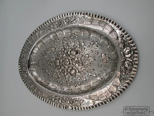 Two sterling silver embossed trays. Floral motifs. Spain. Circa 1900