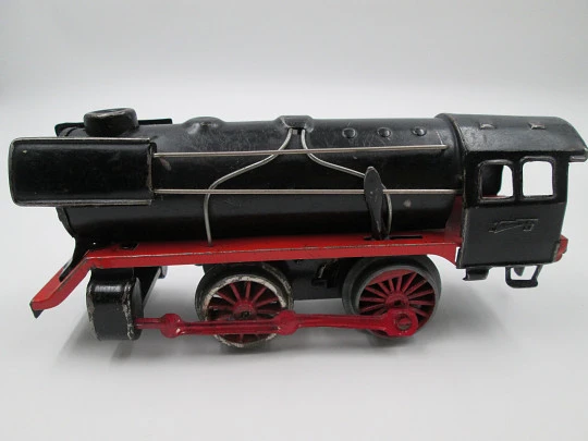 Two train locomotives and a coal tender. Clockwork. Germany. Tinplate