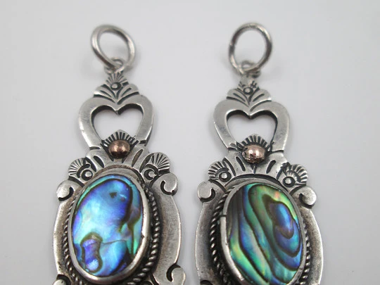 Two women's pendants. Sterling silver and mother-of-pearl. Floral motifs. 1980's