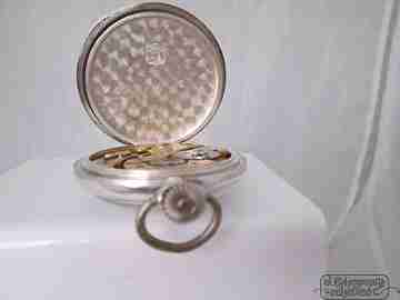 Ulysse Nardin. 900 Sterling silver. Swiss. 1930's. Lion back. Stem-wind