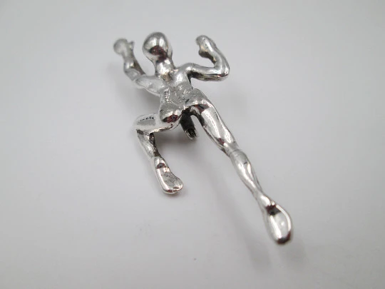 Unisex brooch. Silver plated metal. Figure of a man swimming. Pin on back. Europe. 1970's