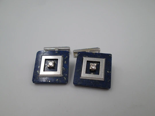 Unisex cufflinks. 18 karat white gold, lapis lazuli and two diamonds. Europe