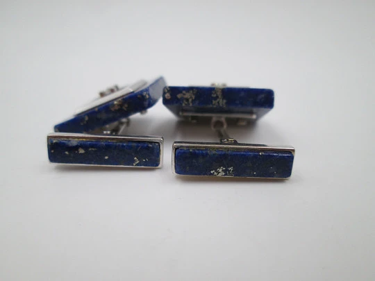 Unisex cufflinks. 18 karat white gold, lapis lazuli and two diamonds. Europe