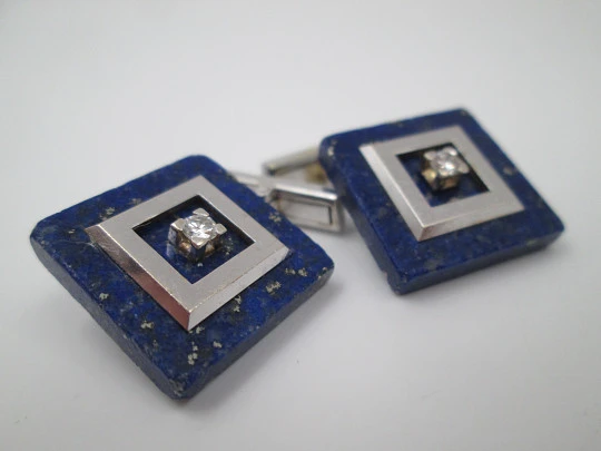 Unisex cufflinks. 18 karat white gold, lapis lazuli and two diamonds. Europe