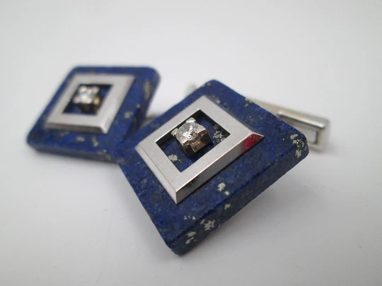 Unisex cufflinks. 18 karat white gold, lapis lazuli and two diamonds. Europe