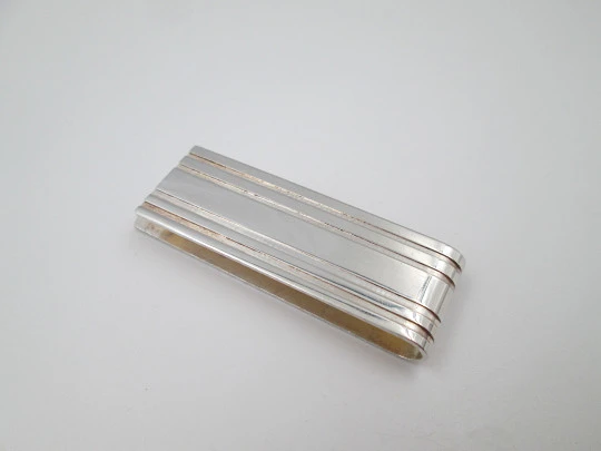 Unisex money clip. 925 sterling silver. Ribbed motifs on front. Italy. Circa 1980's