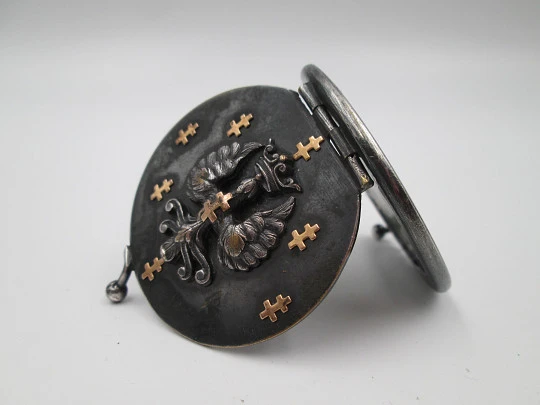 Unisex pocket photo frame. Blackened steel and gold trims. Heraldic symbols. Europe Unisex pocket photo frame. Blackened steel and gold trims. Heraldic symbols. Europe