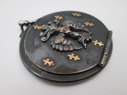 Unisex pocket photo frame. Blackened steel and gold trims. Heraldic symbols. Europe Unisex pocket photo frame. Blackened steel and gold trims. Heraldic symbols. Europe