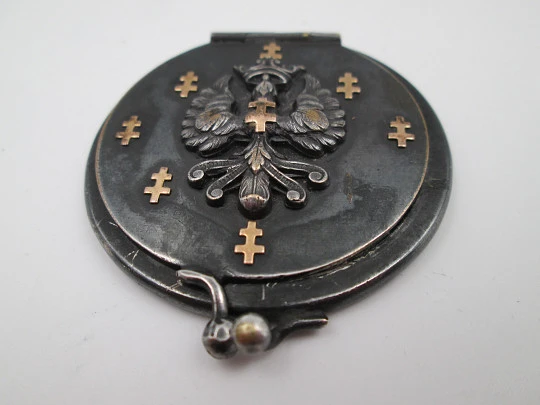 Unisex pocket photo frame. Blackened steel and gold trims. Heraldic symbols. Europe Unisex pocket photo frame. Blackened steel and gold trims. Heraldic symbols. Europe