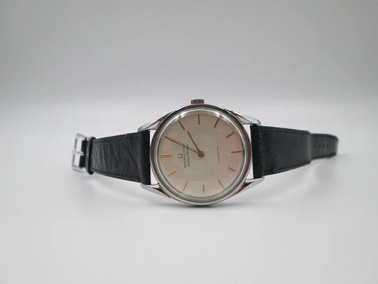 Universal Genève Golden Shadow wristwatch. Stainless steel. Automatic. Swiss. 1960's