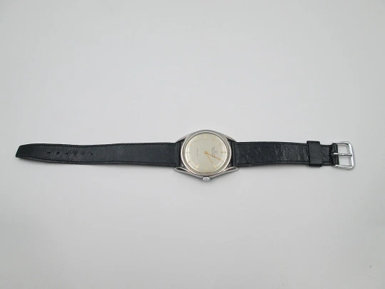 Universal Genève Golden Shadow wristwatch. Stainless steel. Automatic. Swiss. 1960's