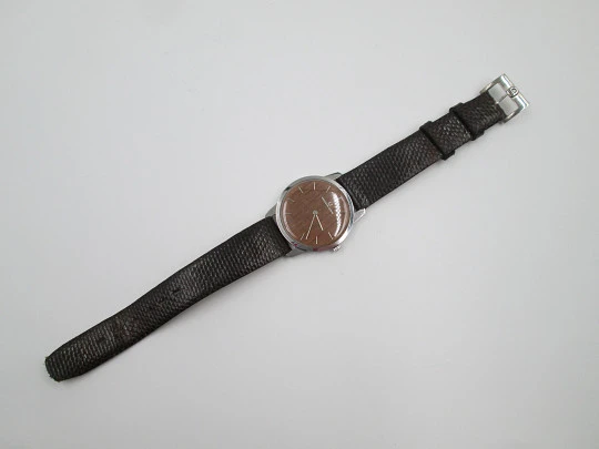 Universal Geneve rare dress watch. Ultra thin steel case and wooden dial. Manual wind