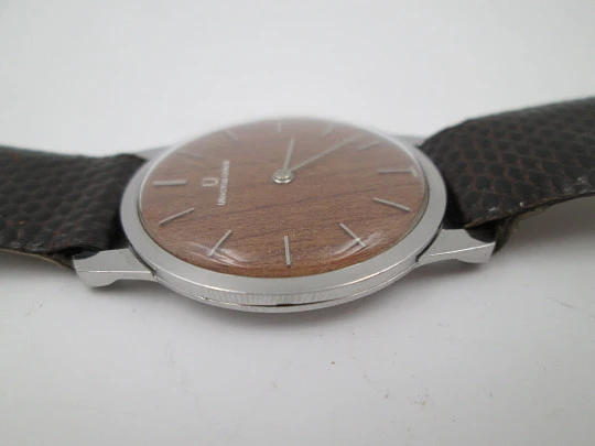 Universal Geneve rare dress watch. Ultra thin steel case and wooden dial. Manual wind