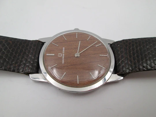 Universal Geneve rare dress watch. Ultra thin steel case and wooden dial. Manual wind