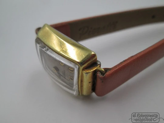 Universal Genève. Steel & gold plated. Manual wind. Woman. Swiss. 1940's