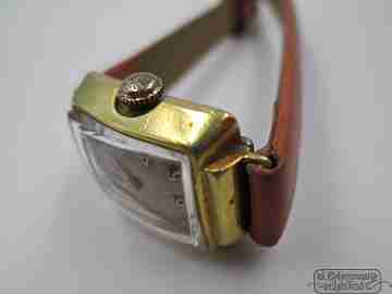 Universal Genève. Steel & gold plated. Manual wind. Woman. Swiss. 1940's