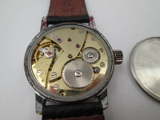 Vanguard Special. Chromed metal and steel. Manual wind. Small seconds hand. 1960's