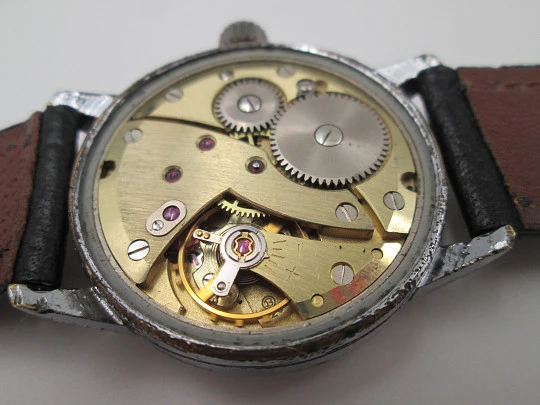 Vanguard Special. Chromed metal and steel. Manual wind. Small seconds hand. 1960's