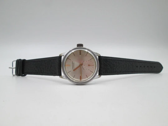 Vanguard Special. Metal cromado y acero. Cuerda manual. Pequeño segundero. 1960