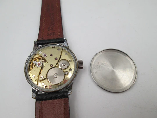 Vanguard Special. Metal cromado y acero. Cuerda manual. Pequeño segundero. 1960