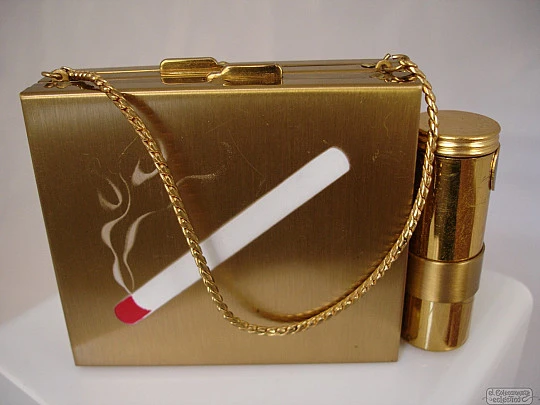 Vanity case. USA. Golden metal and enamel. 1940s. Lipstick. Mirror