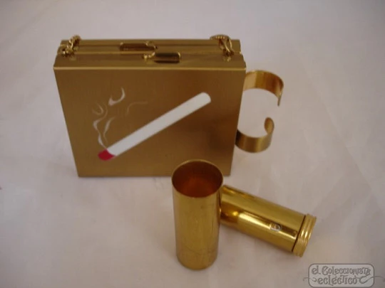 Vanity case. USA. Golden metal and enamel. 1940s. Lipstick. Mirror