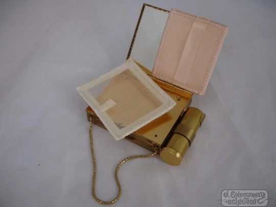 Vanity case. USA. Golden metal and enamel. 1940s. Lipstick. Mirror