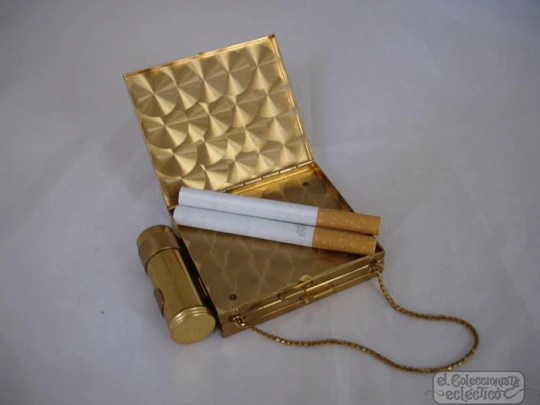 Vanity case. USA. Golden metal and enamel. 1940s. Lipstick. Mirror