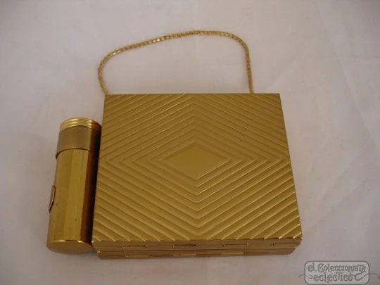 Vanity case. USA. Golden metal and enamel. 1940s. Lipstick. Mirror