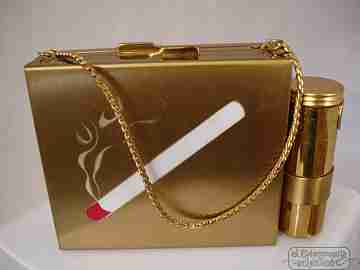 Vanity case. USA. Golden metal and enamel. 1940s. Lipstick. Mirror