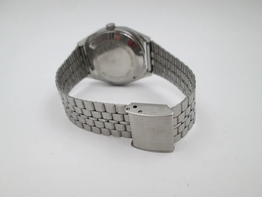 Vaurie. Stainless steel. Automatic. Date and day. Bracelet. 1970's. Swiss made