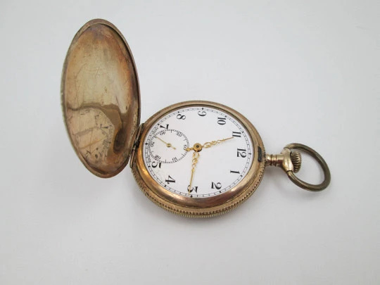 Victory hunter-case pocket watch. Gold plated metal. Stem-wind. Ornate lids. 1910's. Swiss