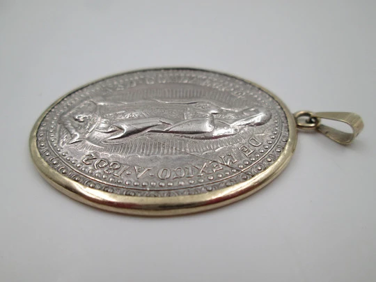 Virgin of Guadalupe medal. 925 sterling silver. 10 karat gold ring and edge. Mexico, 1802