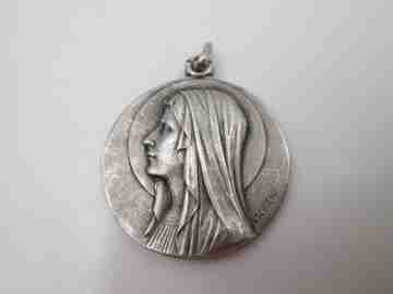Virgin of Lourdes medal. Sterling silver. High relief. Escudero artist. 1950's. Europe