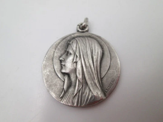 Virgin of Lourdes medal. Sterling silver. High relief. Escudero artist. 1950's. Europe